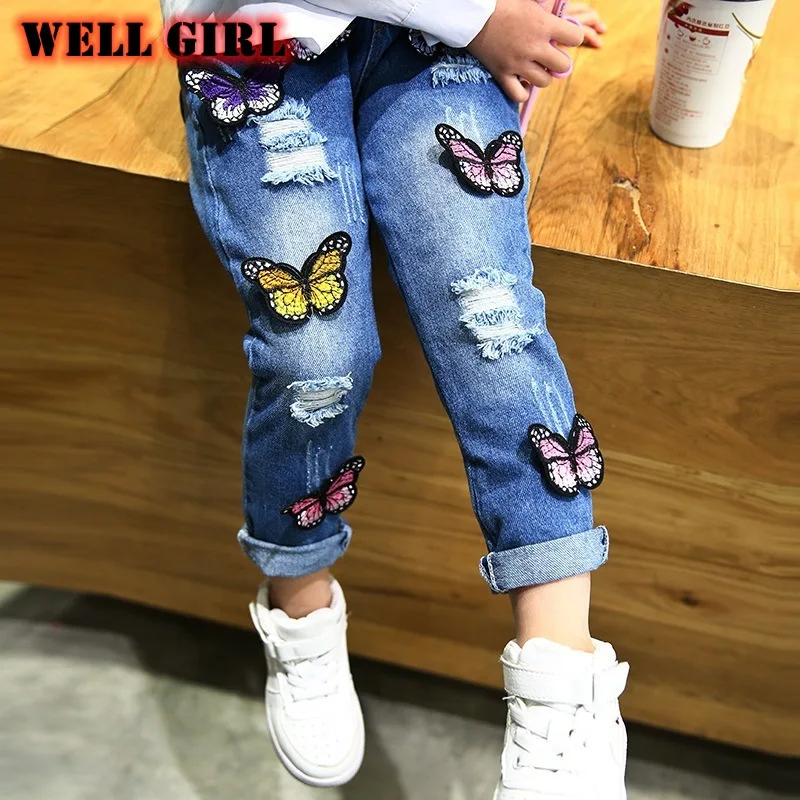 Pomlad baby dekleta jeans hlače sredi pasu raztrgala stiski hlače metulj pritrjena otroci otroci traper 1 do 6 let HZ20180121