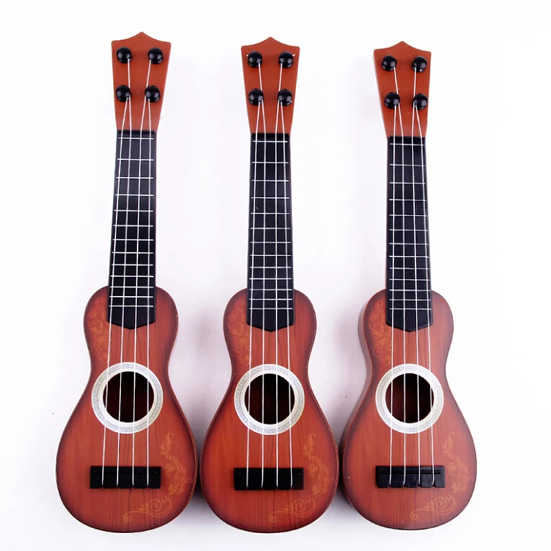 Plastični Ukulele Hawaiian Instrument String Kitare za Začetnike, Darila Kitara Igrača 35*9*3 cm, Naključno Barvo