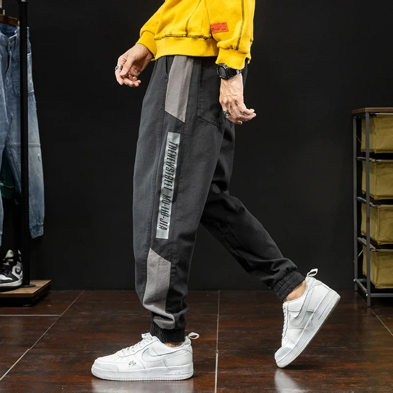 Jeseni Novo Moda Za Moške Jeans Trak Razrezana Oblikovalec Priložnostne Tovora Hlače Moški Harem Hlače Ulične Hip Hop Joggers Hlače